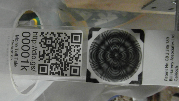 Moiré Tell Tale showing nearly-centred concentric circular fringes